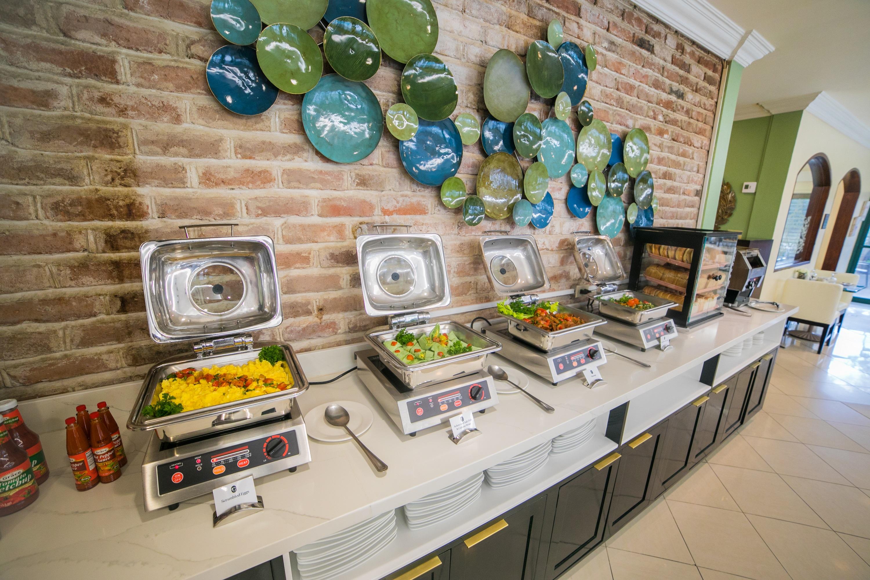 Courtleigh Hotel & Suites Kingston Restaurante foto